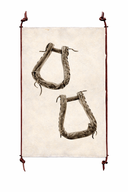 Two wooden horse stirrups on a textured beige background with a leather frameless frame