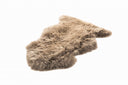 Brown fur rug on a white background