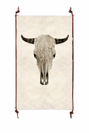 Bull skull on a white background with leather straps