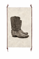 Pair of cowboy boots on a textured paper background with decorative leather frame.