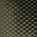 Close-up of a textured fabric with a honeycomb pattern in dark green.