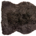 Brown fluffy rug on a white background