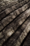 Close-up of brown fur fabric with a soft texture