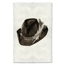 Brown cowboy hat with a feather on a textured white background