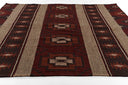 Adobe Red Hand-Woven Rug
with geometric pattern on a white background
