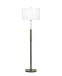 Floor lamp with a white shade and bronze base on a white background