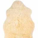 cream fluffy rug on a white background