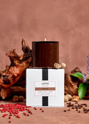 LAFCO candle with packaging on a brown background with natural elements