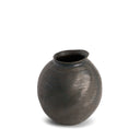 Bronze vase with textured surface on a white background