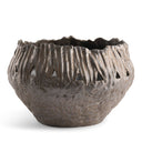 A rustic, textured ceramic planter bowl with a scalloped, leaf-like rim and triangular cutouts, shown on a clean white background.