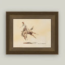 Framed artwork of a cowboy riding a bucking bronco on a light background