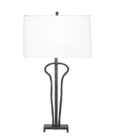 A table lamp with a large white rectangular drum shade and a dark textured metal base featuring a curved central stem and square footed stand, shown on a plain white background.