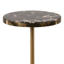 Round table with petrified wood top and gold base on a white background