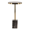 Small round petrified wood table with brass base on a white background