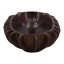 Dark brown decorative bowl with textured surface on a white background