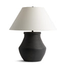 Drew Table lamp with a black base and white shade on a white background