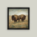 Framed print of two bison standing in a golden prairie under a soft overcast sky
