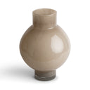 Beige ceramic vase on a white background