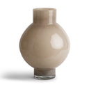 Beige ceramic vase on a white background