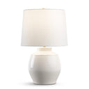 White table lamp with a beige shade on a white background