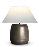 Graham Table Lamp with a textured ceramic bronze base and white shade on a white background
