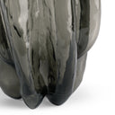 Close-up of a glossy black and gray ceramic vase on a white background