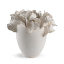 White ceramic vase with floral design on a white background