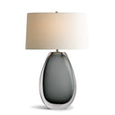 James Table Lamp with a smoked glass base and beige shade on a white background
