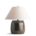 Jennifer Table lamp with a textured bronze base and white shade on a white background