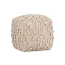 Textured cube-shaped ottoman on a white background