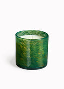 LAFCO Woodland Spruce scented candle in a vibrant green glass vessel with subtle gold marbling and white wax with white background