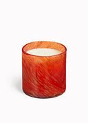 LAFCO Pomegranate Fizz scented candle in a vibrant red glass vessel with subtle gold marbling, white wax and a white background
