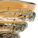 Close-up of a textured amber glass bowl with organic, bubbly edges and a smooth curved rim, shown on a white background.