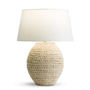 Oristano Table lamp with woven corn husk base and white shade on a white background