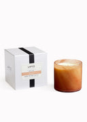 Candle with a white box featuring 'Lafco' branding on a white background