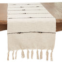 Cream woven table runner with thin black stripes and tasseled fringe