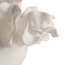 Close-up of a textured ceramic bowl on a white background