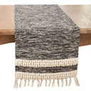 Black and cream woven table runner with textured stripe detailing and fringed ends