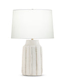 Valentina Table lamp with a textured white base and white shade on a white background