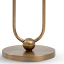 close-up Bronze-colored decorative lamp base with a round base and curved rod on a white background