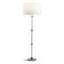Floor lamp with a white shade and gold base on a white background