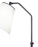 A close-up of a modern floor lamp with a matte black adjustable metal arm and pole, paired with a large white tapered drum shade, shown against a solid white background.