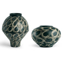 Two black ceramic vases with circular patterns on a white background